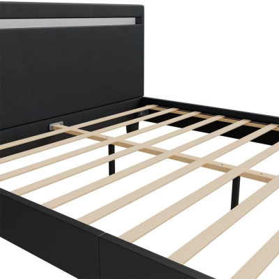 Moderná čierna čalúnená posteľ 140x200 s LED a roštom